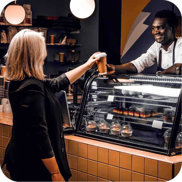 Customer earning a digital stamp at a coffee shop